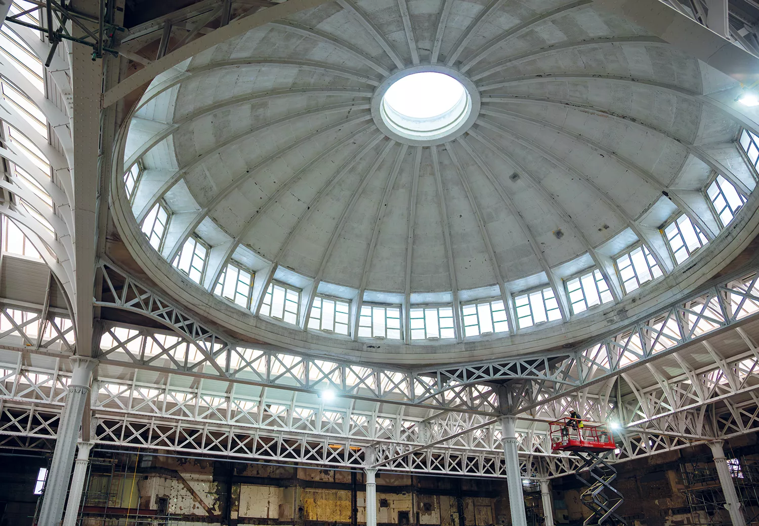 A photo of the interior of Smithfield General Market showing workmanship on the dome and multiple lantern roofs that will be a part of London Museum - the world's smartest museum