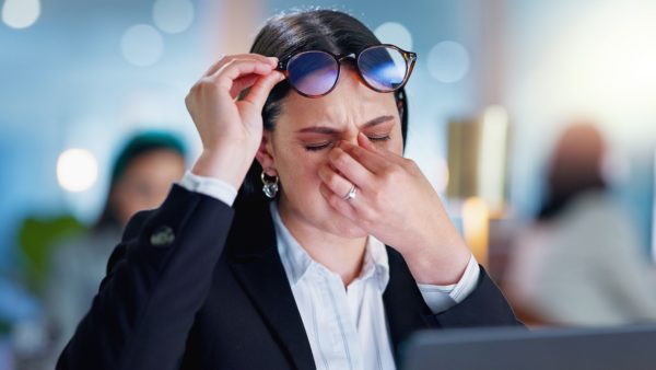 Photo of woman suffering tech fatigue