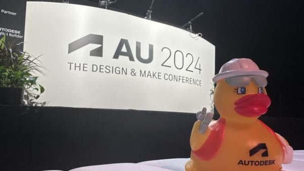 Image from Autodesk University - podcast stage and branded rubber duck