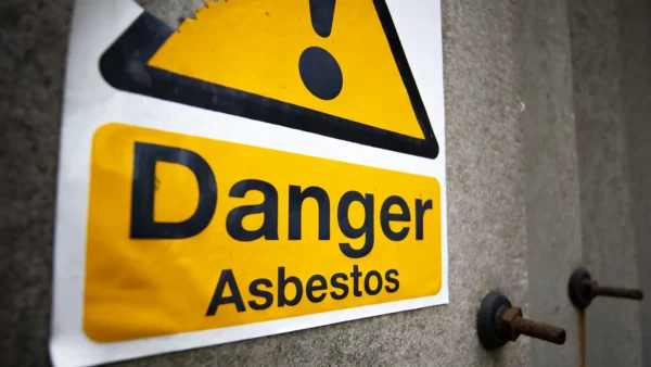 Image of danger sign for asbestos information management story